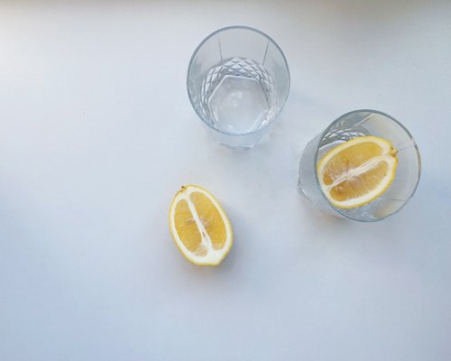 Glass of fresh water with lemon slice
